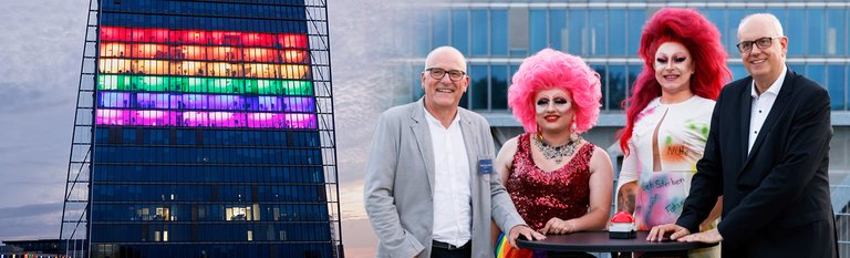 Stefan Messerknecht, Joyce DeLone, Ludmila Pacdikova und der Bremer Bürgermeister Dr. Andreas Bovenschulte aktivieren die Regenbogen-Beleuchtung am Weser Tower 